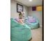 Bright ' playroom with comfortable beanbag chairs, artwork, and a playful atmosphere at 27290 E Nova Cir, Aurora, CO 80016
