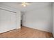 Bedroom with hardwood floors and a closet at 2080 S Danube Ct, Aurora, CO 80013