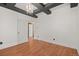 Bedroom with hardwood floors and an open door at 2080 S Danube Ct, Aurora, CO 80013