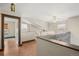 Bright hallway with modern railing and wood floors at 2080 S Danube Ct, Aurora, CO 80013