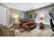 Inviting bedroom features a comfortable bed, side tables with lamps, and natural light at 9567 Brentwood Way # A, Broomfield, CO 80021
