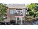 Home's exterior with a private balcony, siding, and surrounded by trees at 9567 Brentwood Way # A, Broomfield, CO 80021