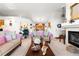 Cozy living room featuring neutral colors, fireplace, and an open layout at 9567 Brentwood Way # A, Broomfield, CO 80021