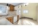 Kitchen featuring tile floors, cabinets, dual bowl sink, and natural lighting at 2541 Yarmouth Ave, Boulder, CO 80301