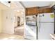 Kitchen entrance featuring standard appliances, and natural light at 2541 Yarmouth Ave, Boulder, CO 80301