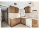 Functional kitchen with tile countertops, oak cabinets, and tiled flooring at 2541 Yarmouth Ave, Boulder, CO 80301