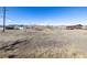 A view of the land with some houses in the background under a bright blue sky at 2541 Yarmouth Ave, Boulder, CO 80301