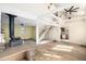 Inviting living room featuring an open floor plan, hardwood floors, and staircase at 2541 Yarmouth Ave, Boulder, CO 80301