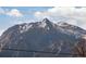 Scenic view of snow-dusted mountain landscape featuring rocky cliffs and tree-covered slopes at 2541 Yarmouth Ave, Boulder, CO 80301