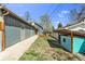 View of the backyard with a detached garage and shed at 505 S Roosevelt Rd, Lafayette, CO 80026