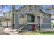 Charming two-story home featuring a raised porch, garden-level entry, and fresh exterior paint in a lovely suburban setting at 505 S Roosevelt Rd, Lafayette, CO 80026
