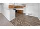 Kitchen features wood cabinets and appliances at 10381 Cook Way # 205, Thornton, CO 80229