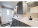 Bathroom featuring modern fixtures, sleek cabinets, and stylish tile work, creating a relaxing space at 840 Tucson St, Aurora, CO 80011