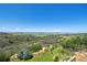 Lush backyard with rolling hills and mountain views at 1175 Ridge Oaks Dr, Castle Rock, CO 80104