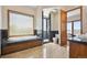 Spacious bathroom with marble accents, a soaking tub, and separate shower at 1175 Ridge Oaks Dr, Castle Rock, CO 80104