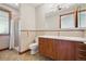 Bathroom with glass shower, modern vanity, and tile accents at 1175 Ridge Oaks Dr, Castle Rock, CO 80104