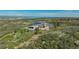 Stunning modern home boasts sleek design and breathtaking mountain views from its hilltop location at 1175 Ridge Oaks Dr, Castle Rock, CO 80104