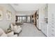 Expansive primary bedroom suite with a fireplace, a wet bar, and access to a deck at 1175 Ridge Oaks Dr, Castle Rock, CO 80104