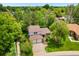 Aerial view of a lovely two-story home surrounded by lush greenery, showcasing its desirable neighborhood location at 6544 Alkire Ct, Arvada, CO 80004