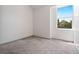 Cozy bedroom with natural light from the window and a neutral carpet at 6544 Alkire Ct, Arvada, CO 80004