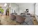 Stylish living room with contemporary decor and large mirror, creating a bright and airy space at 6544 Alkire Ct, Arvada, CO 80004