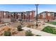Community park with playground equipment, landscaping, and walkways on a sunny day at 14341 E Tennessee Ave # 203, Aurora, CO 80012