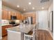 Modern kitchen with granite countertops, stainless appliances, and ample cabinet space at 14341 E Tennessee Ave # 203, Aurora, CO 80012