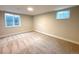 Spacious basement area with carpet and windows at 18073 E Belleview Pl, Centennial, CO 80015