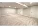 Finished basement area offering neutral carpet and multiple storage areas at 18073 E Belleview Pl, Centennial, CO 80015