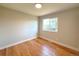 Bright bedroom with hardwood floors and lots of natural light at 18073 E Belleview Pl, Centennial, CO 80015