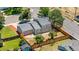 Overhead view of the renovated home showcasing the backyard, new roof, and gray siding at 1705 Cathay Ct, Aurora, CO 80011