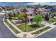 Beautiful home with spacious fenced yard, mature trees, and a seating area at 22965 Allendale Ave, Parker, CO 80138