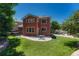 Well-maintained backyard featuring a patio, lawn, and hot tub perfect for outdoor entertaining at 22965 Allendale Ave, Parker, CO 80138