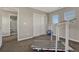Home gym bedroom setup with a treadmill and adjoining bathroom access at 22965 Allendale Ave, Parker, CO 80138