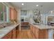 Spacious kitchen with a center island, stainless steel appliances, and an open layout into living spaces at 22965 Allendale Ave, Parker, CO 80138