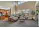 Comfortable living room with a large sectional sofa and an open concept floor plan at 22965 Allendale Ave, Parker, CO 80138