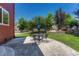 Enjoy outdoor living with a patio and manicured lawn at 22965 Allendale Ave, Parker, CO 80138