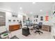 Basement office space with built in shelves and lots of room to work at 5965 S Gaylord Way, Greenwood Village, CO 80121