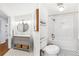 Bathroom with a vanity, toilet, and bathtub/shower combination at 5965 S Gaylord Way, Greenwood Village, CO 80121