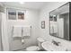 Bathroom featuring a mirror, towels, toilet, and a shower with white curtain at 5965 S Gaylord Way, Greenwood Village, CO 80121