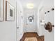 Bright entryway with a hat rack and view of the front door with glass pane at 5965 S Gaylord Way, Greenwood Village, CO 80121