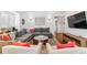 Spacious living room with a comfortable sectional sofa and stylish decor at 5965 S Gaylord Way, Greenwood Village, CO 80121