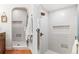 Shower with a full glass door and stylish tile work at 5965 S Gaylord Way, Greenwood Village, CO 80121