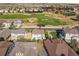 Aerial view of home near golf course, park, and trails at 11960 S Allerton Cir, Parker, CO 80138