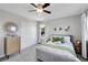 Cozy bedroom with a floral bedspread and built-in wardrobe at 11960 S Allerton Cir, Parker, CO 80138