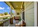 Inviting front porch with seating and landscaping at 11960 S Allerton Cir, Parker, CO 80138