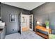 Bright home office features built-in shelving and French doors at 11960 S Allerton Cir, Parker, CO 80138