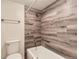 Clean bathroom with a shower/tub combination and wood-look tile at 2880 S Locust St # 704N, Denver, CO 80222