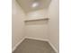 Large walk-in closet with overhead shelving at 2880 S Locust St # 704N, Denver, CO 80222