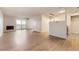 Bright living room with fireplace and sliding glass doors leading to a balcony at 2880 S Locust St # 704N, Denver, CO 80222